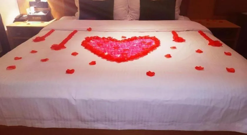 Bed in Green Tree Inn Guangxi Wuzhou 2nd Xinxing Road Liangguang Market