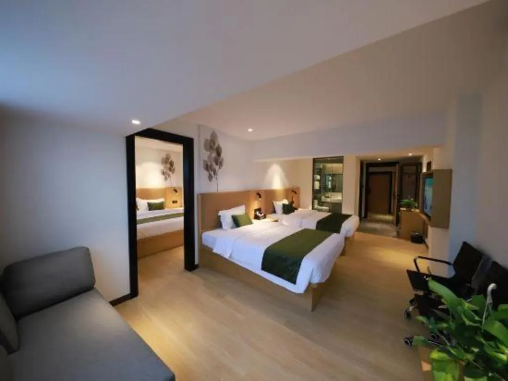 Bed in Green Tree Inn Guangxi Wuzhou 2nd Xinxing Road Liangguang Market