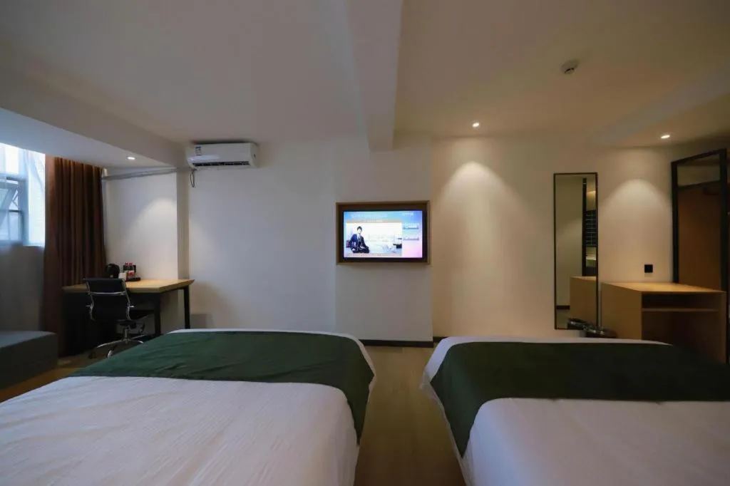 Bed in Green Tree Inn Guangxi Wuzhou 2nd Xinxing Road Liangguang Market
