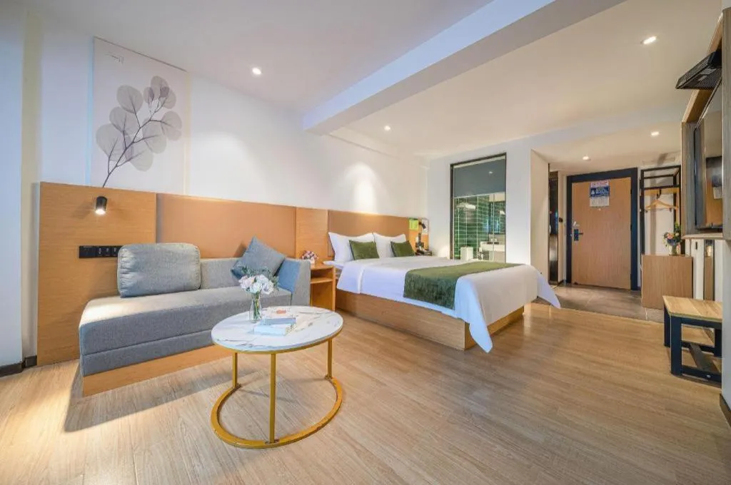 Bed in Green Tree Inn Guangxi Wuzhou 2nd Xinxing Road Liangguang Market