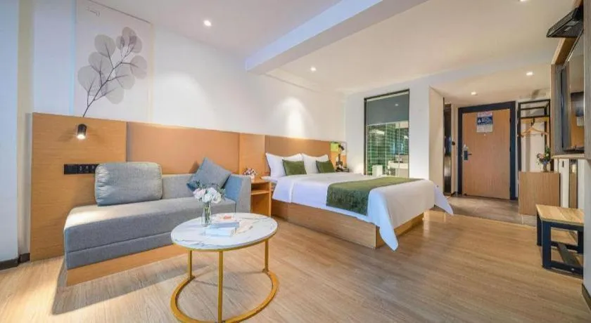 Bed in Green Tree Inn Guangxi Wuzhou 2nd Xinxing Road Liangguang Market