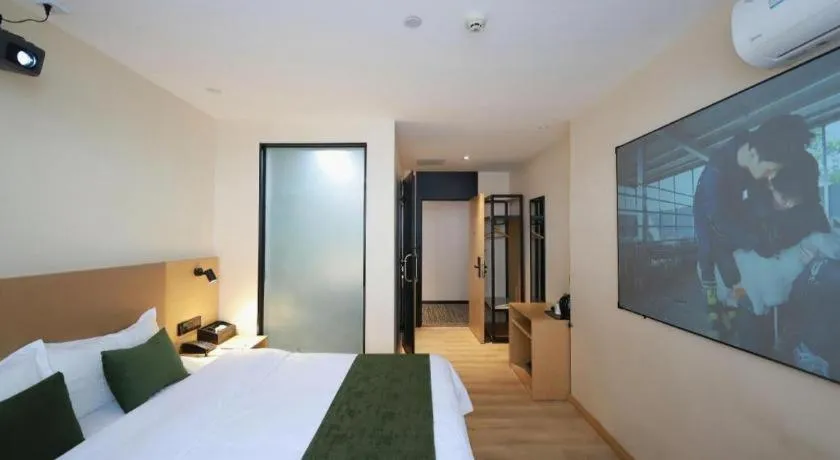 Bed in Green Tree Inn Guangxi Wuzhou 2nd Xinxing Road Liangguang Market