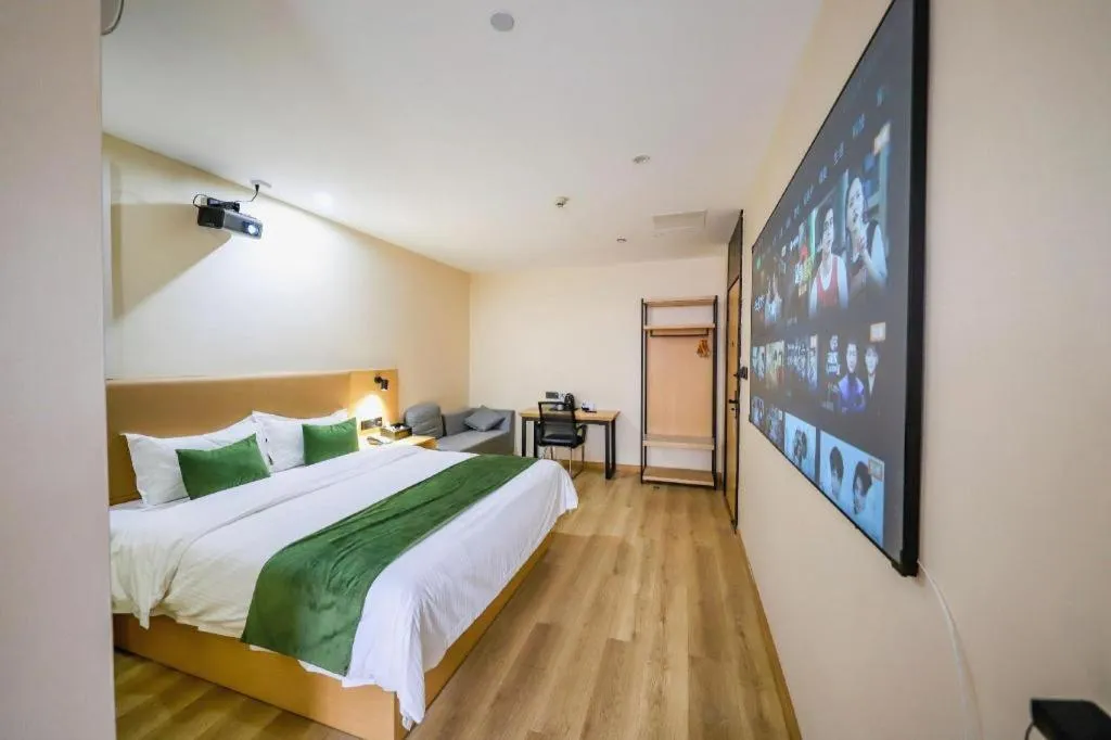 Bed in Green Tree Inn Guangxi Wuzhou 2nd Xinxing Road Liangguang Market