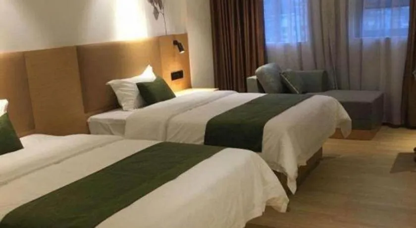 Bed in Green Tree Inn Guangxi Wuzhou 2nd Xinxing Road Liangguang Market