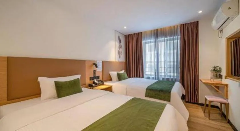 Bed in Green Tree Inn Guangxi Wuzhou 2nd Xinxing Road Liangguang Market