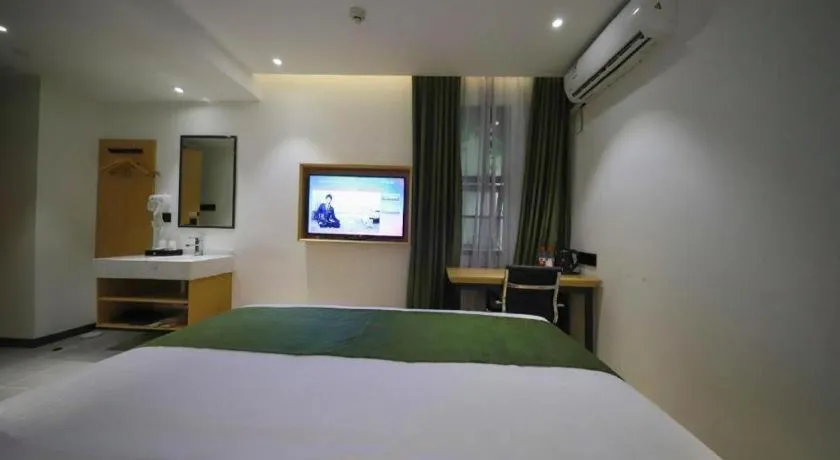 Bed in Green Tree Inn Guangxi Wuzhou 2nd Xinxing Road Liangguang Market