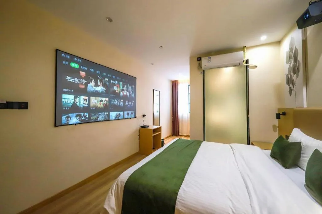 Bed in Green Tree Inn Guangxi Wuzhou 2nd Xinxing Road Liangguang Market