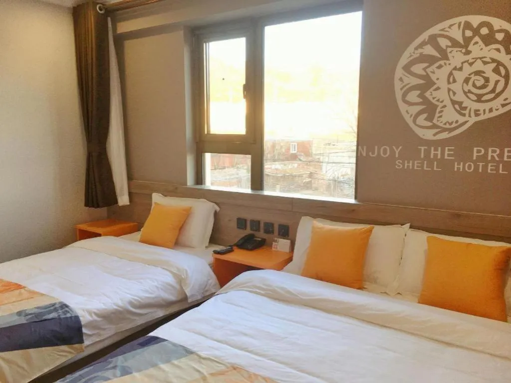 Bed in Shell Hotel Beijing Miyun District Shuiku Yangguang