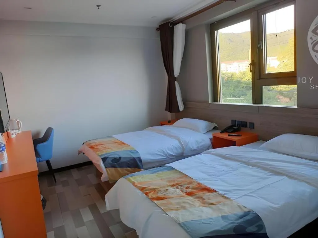 Bed in Shell Hotel Beijing Miyun District Shuiku Yangguang