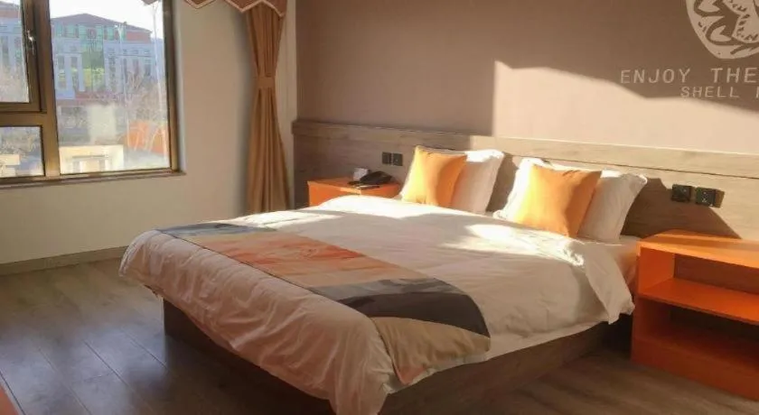 Bed in Shell Hotel Beijing Miyun District Shuiku Yangguang