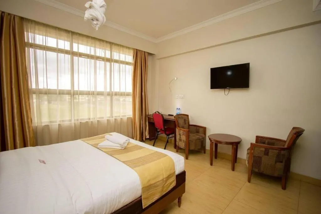 Bed in Miale The Hotel