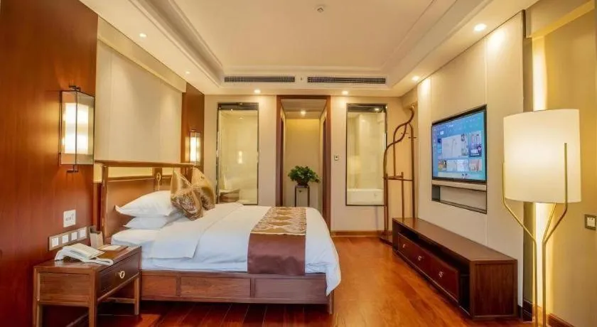 Bed in GreenTree Eastern Hotel Linyi Linshu County Aegean Sea