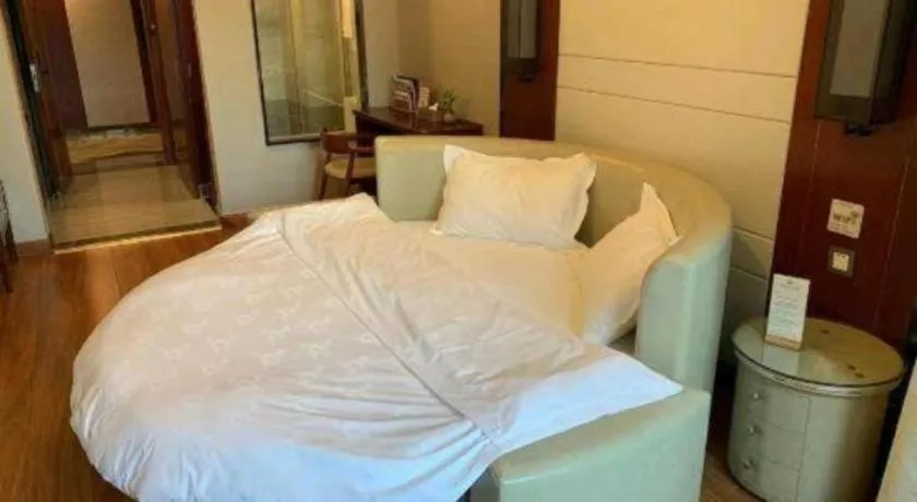 Bed in GreenTree Eastern Hotel Linyi Linshu County Aegean Sea