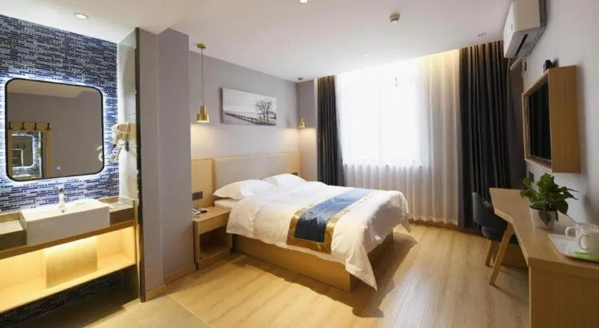 Bed in Shell Hotel Shanghai Normal University Hongcao Road Metro Station Guiping Road