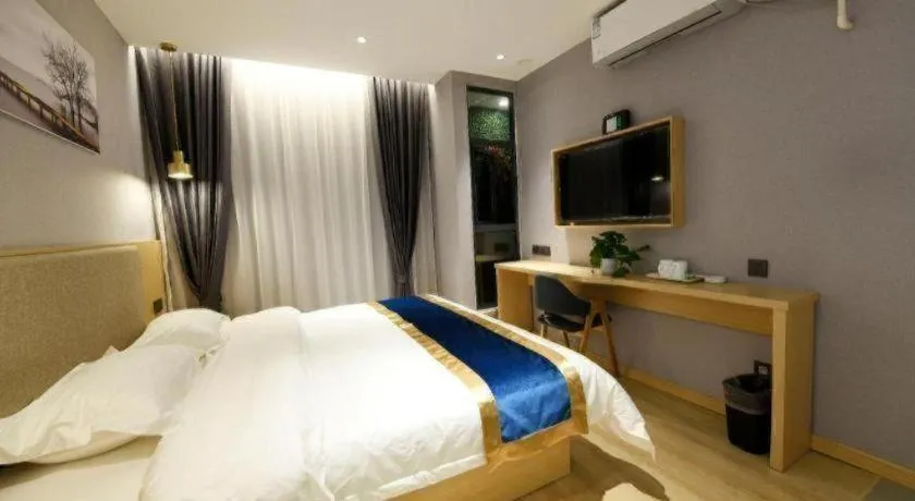Bed in Shell Hotel Shanghai Normal University Hongcao Road Metro Station Guiping Road