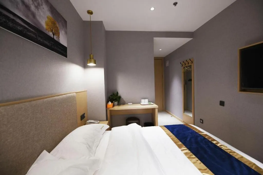 Bed in Shell Hotel Shanghai Normal University Hongcao Road Metro Station Guiping Road