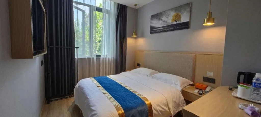 Bed in Shell Hotel Shanghai Normal University Hongcao Road Metro Station Guiping Road