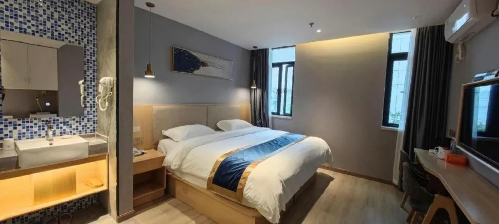 Bed in Shell Hotel Shanghai Normal University Hongcao Road Metro Station Guiping Road