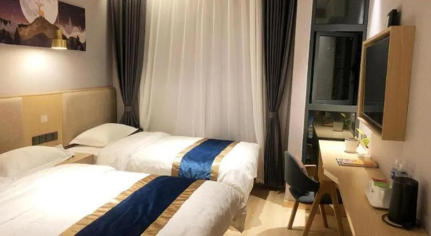 Bed in Shell Hotel Shanghai Normal University Hongcao Road Metro Station Guiping Road