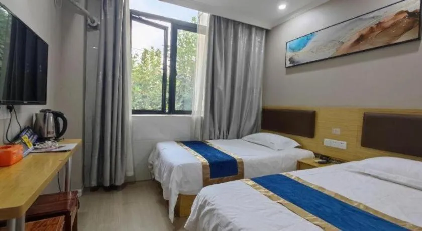 Bed in Shell Hotel Shanghai Normal University Hongcao Road Metro Station Guiping Road
