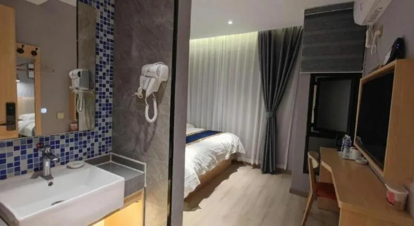 Bed in Shell Hotel Shanghai Normal University Hongcao Road Metro Station Guiping Road