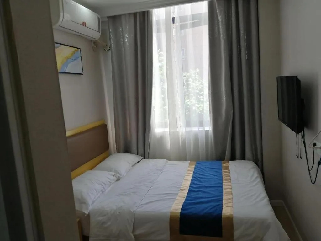 Bed in Shell Hotel Shanghai Normal University Hongcao Road Metro Station Guiping Road
