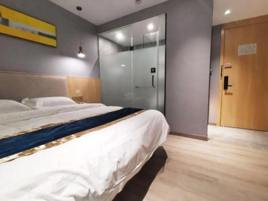 Bed in Shell Hotel Shanghai Normal University Hongcao Road Metro Station Guiping Road