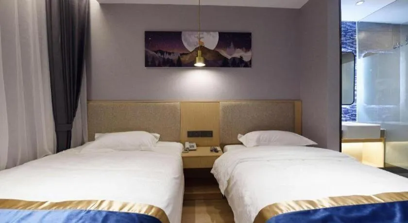 Bed in Shell Hotel Shanghai Normal University Hongcao Road Metro Station Guiping Road