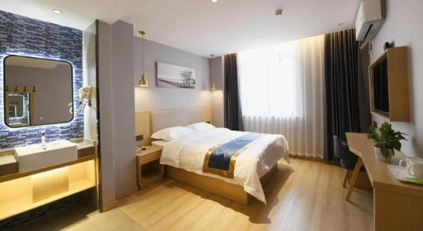 Bed in Shell Hotel Shanghai Normal University Hongcao Road Metro Station Guiping Road