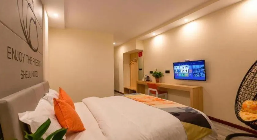 Bed in Shell Hotel Suzhou Zhangjiagang Jingang Town Central Plaza