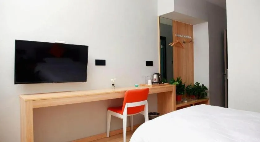 Bed in Shell Hotel Suzhou Zhangjiagang Jingang Town Central Plaza