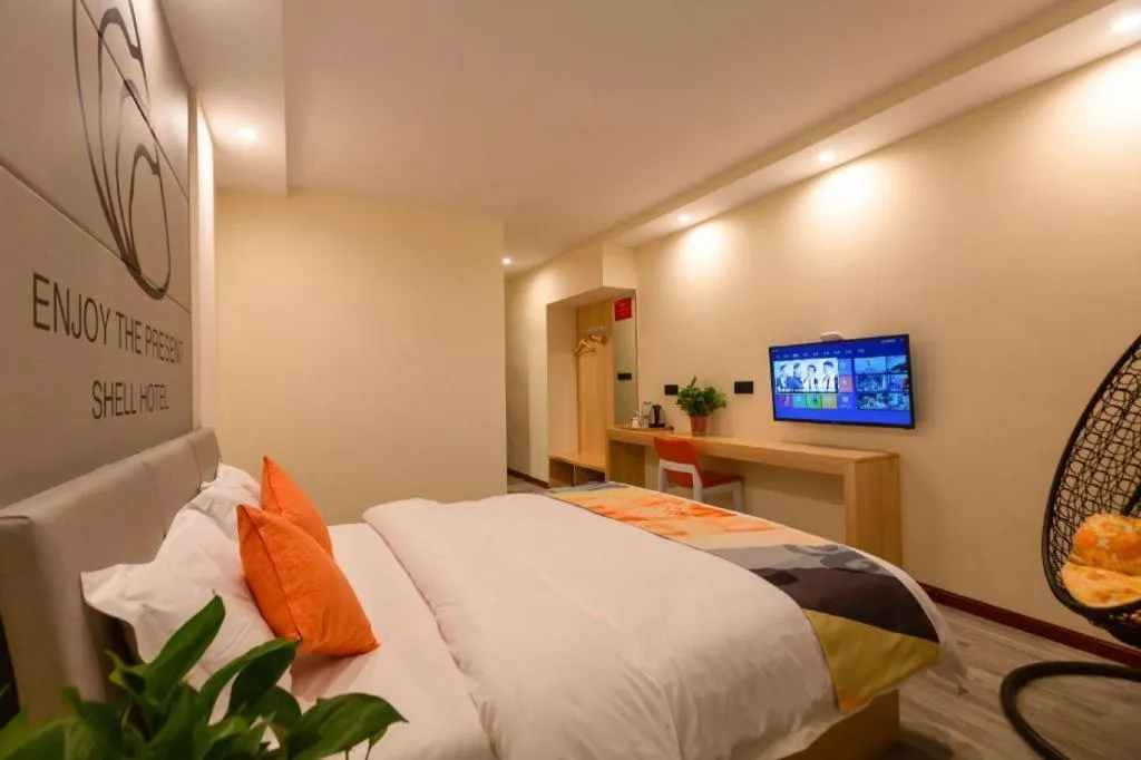 Bed in Shell Hotel Suzhou Zhangjiagang Jingang Town Central Plaza