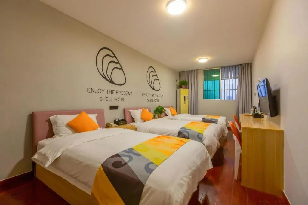 Bed in Shell Hotel Suzhou Zhangjiagang Jingang Town Central Plaza