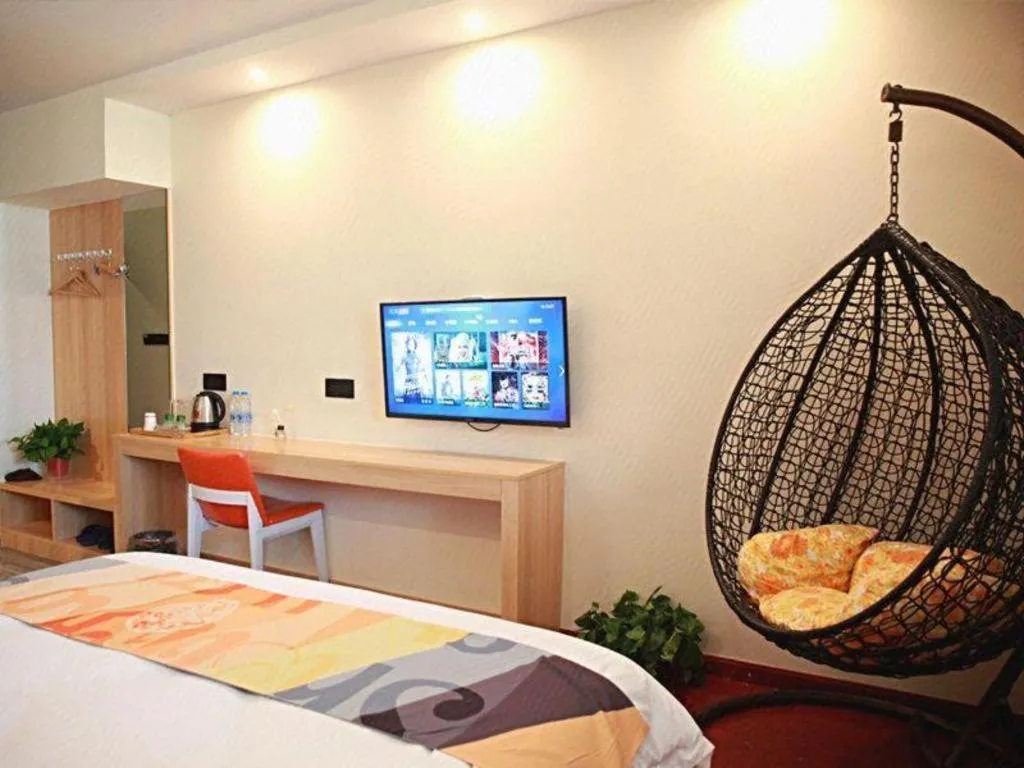 Bed in Shell Hotel Suzhou Zhangjiagang Jingang Town Central Plaza