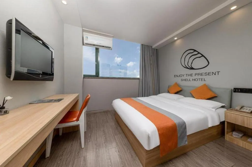 Bed in Shell Hotel Suzhou Zhangjiagang Jingang Town Central Plaza