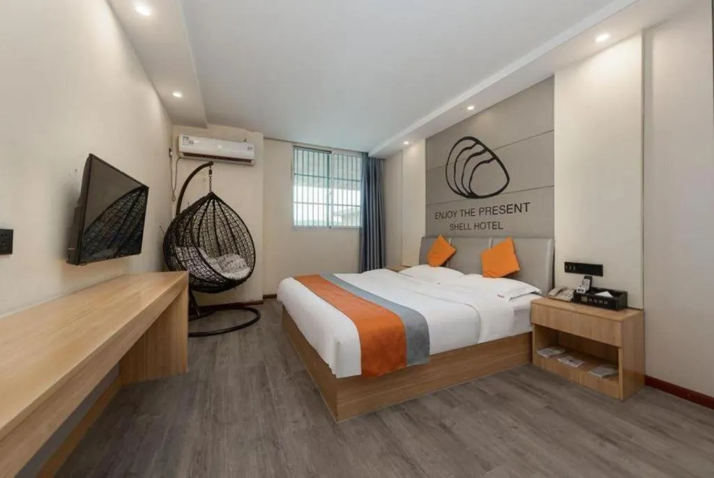 Bed in Shell Hotel Suzhou Zhangjiagang Jingang Town Central Plaza
