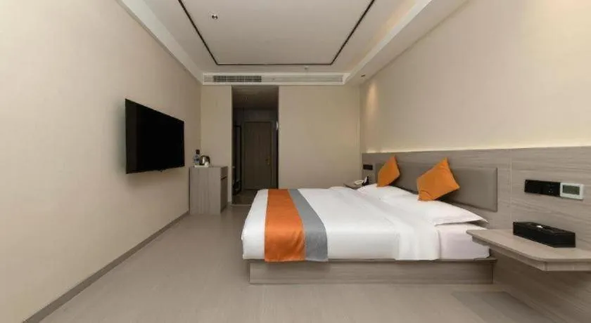 Bed in Shell Hotel Suzhou Zhangjiagang Jingang Town Central Plaza