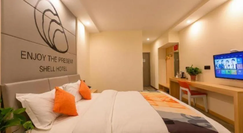 Bed in Shell Hotel Suzhou Zhangjiagang Jingang Town Central Plaza