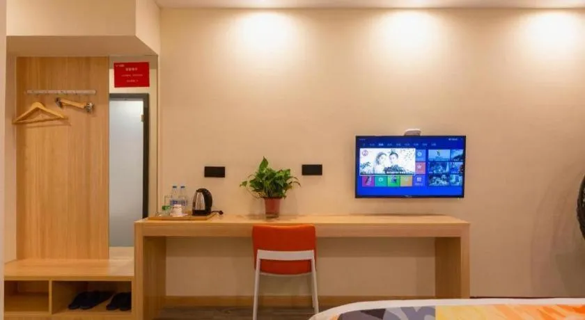 Bed in Shell Hotel Suzhou Zhangjiagang Jingang Town Central Plaza