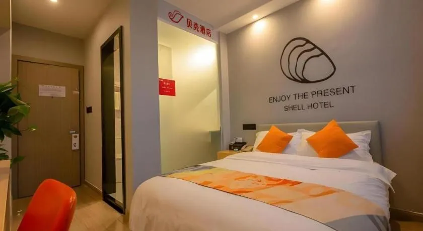 Bed in Shell Hotel Suzhou Zhangjiagang Jingang Town Central Plaza