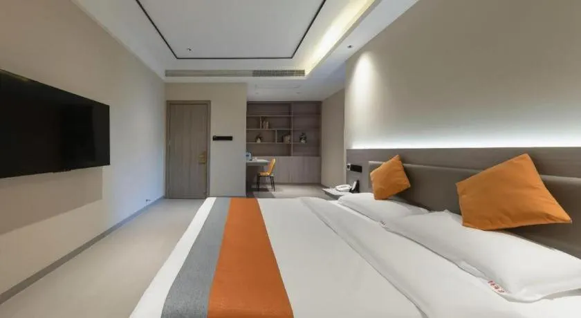 Bed in Shell Hotel Suzhou Zhangjiagang Jingang Town Central Plaza