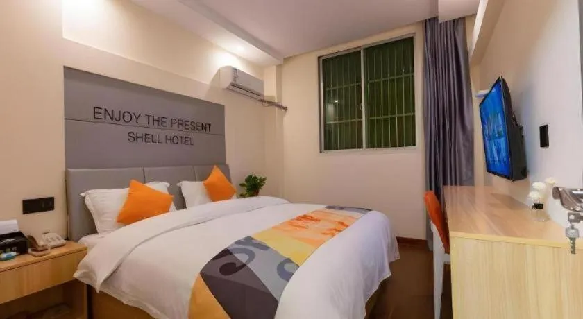 Bed in Shell Hotel Suzhou Zhangjiagang Jingang Town Central Plaza