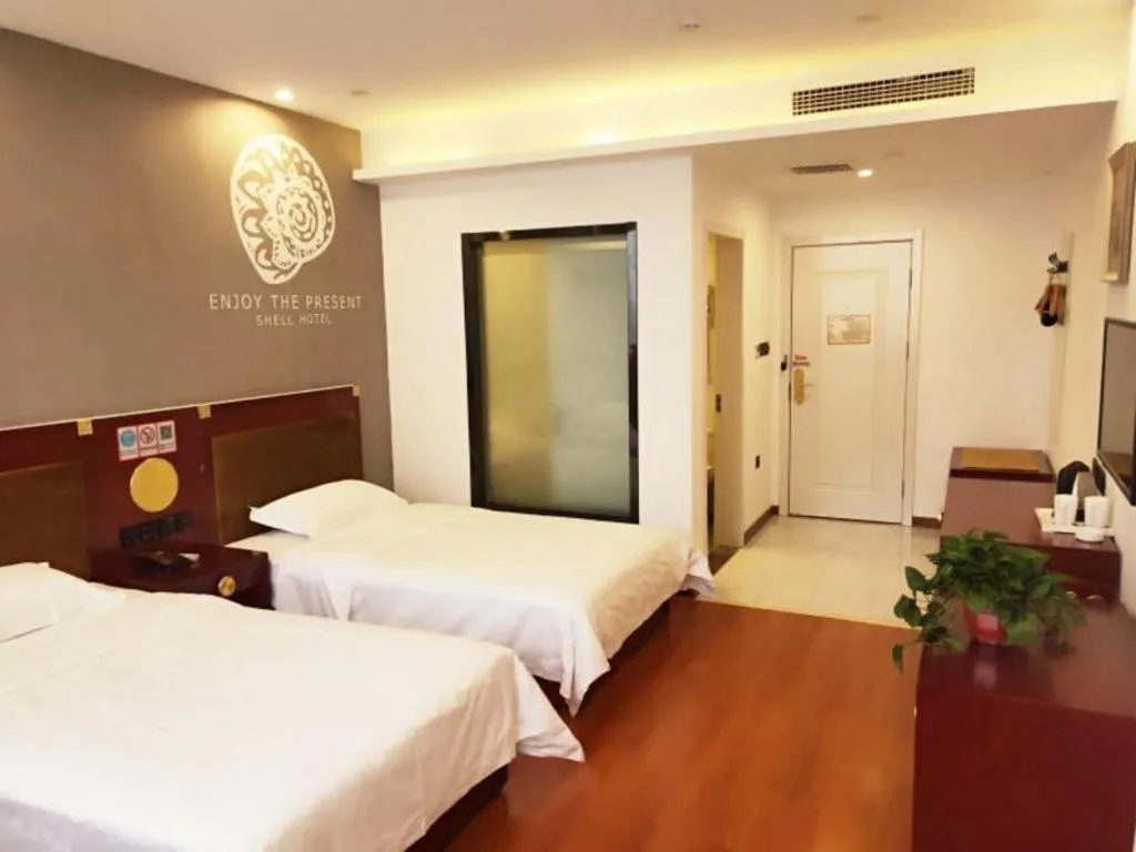 Bed in Shell Hotel Liaocheng Dongchang Xi Road Railway Station