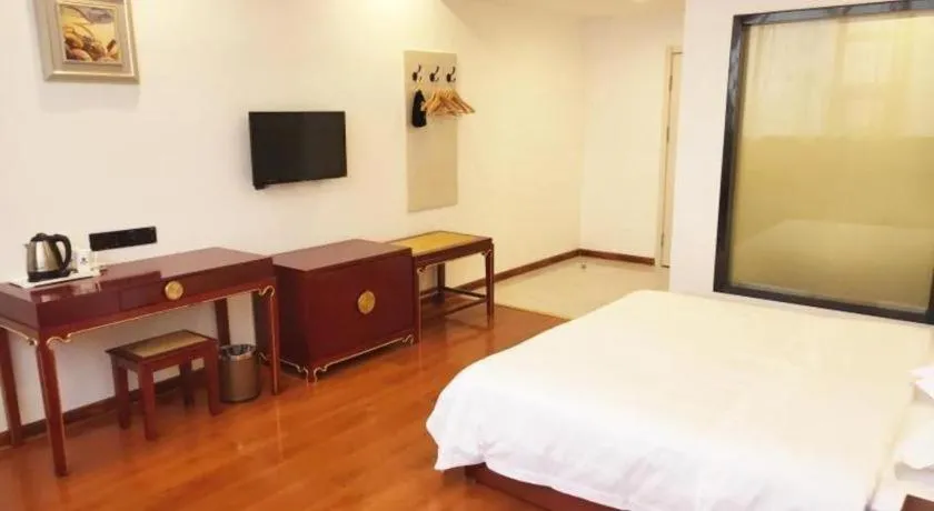 Bed in Shell Hotel Liaocheng Dongchang Xi Road Railway Station