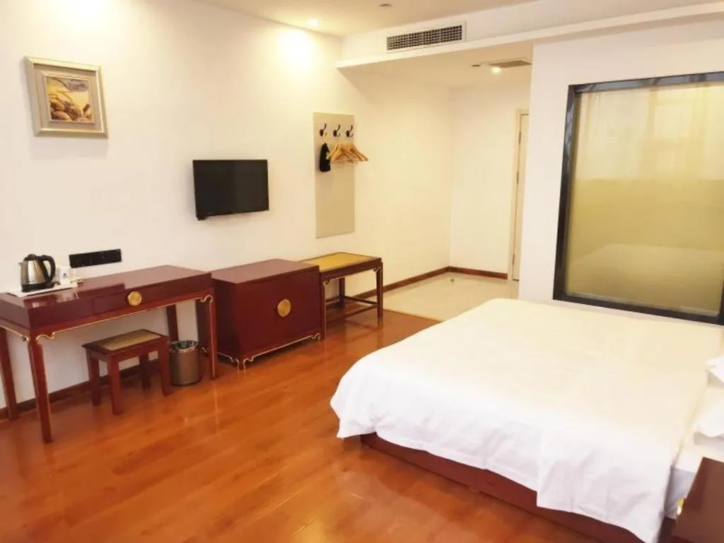 Bed in Shell Hotel Liaocheng Dongchang Xi Road Railway Station