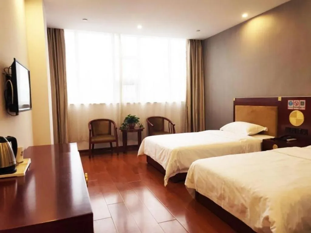 Bed in Shell Hotel Liaocheng Dongchang Xi Road Railway Station