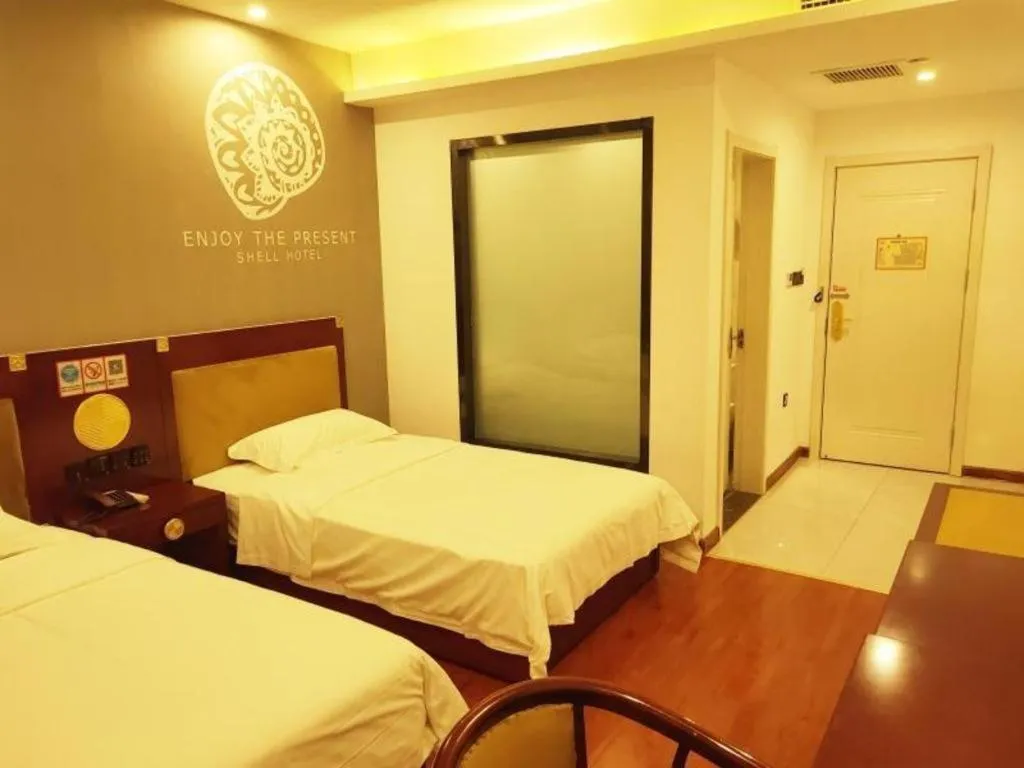 Bed in Shell Hotel Liaocheng Dongchang Xi Road Railway Station