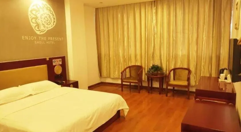 Bed in Shell Hotel Liaocheng Dongchang Xi Road Railway Station