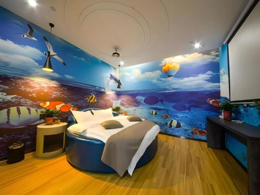 Bed in Shell Hotel Zhengzhou East High-Speed Railway Station Zhengdong Commerical Center