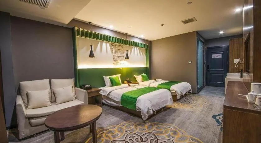 Bed in Shell Hotel Zhengzhou East High-Speed Railway Station Zhengdong Commerical Center